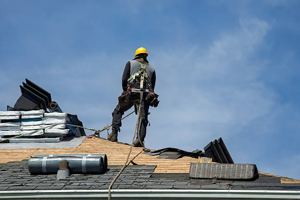 Professional Roof Replacement technician working in Rome City, IN